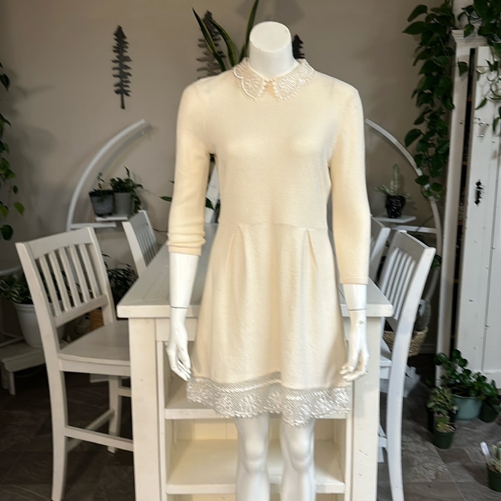 ASOS cream coloured dress with a lace trim around neckline and hemline US6